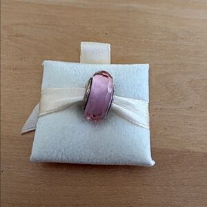 Pandora Pink Fascinating Faceted Murano charm.